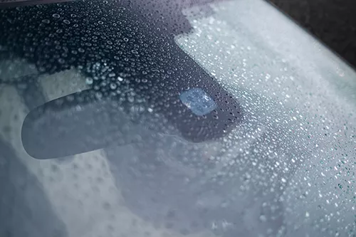 Car window with rain sensor